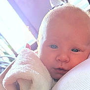 Cambria joined the competition — help win amazing prizes! baby, infant, blanket, closeup, face, skin, person, soft, comfort, resting, child, young, holding, shoulder, indoor, light, gentle, peaceful, cute, portrait