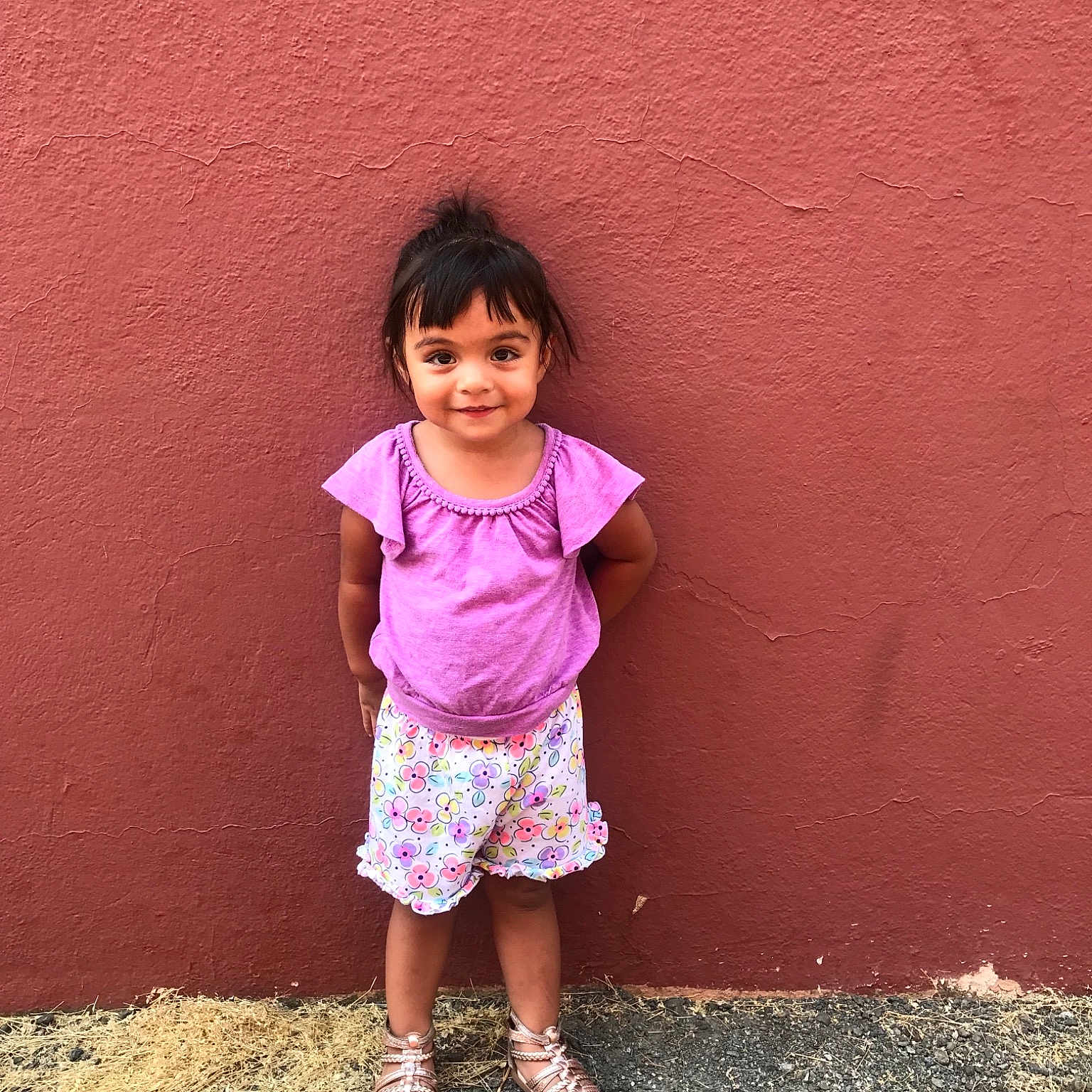 Avah is registered to the contest to win money with this photo: child, cool, day, facial_expression, fun, girl, happiness, human, joy, pattern, person, pink, play, shorts, skin, smile, snapshot, standing, summer, temple