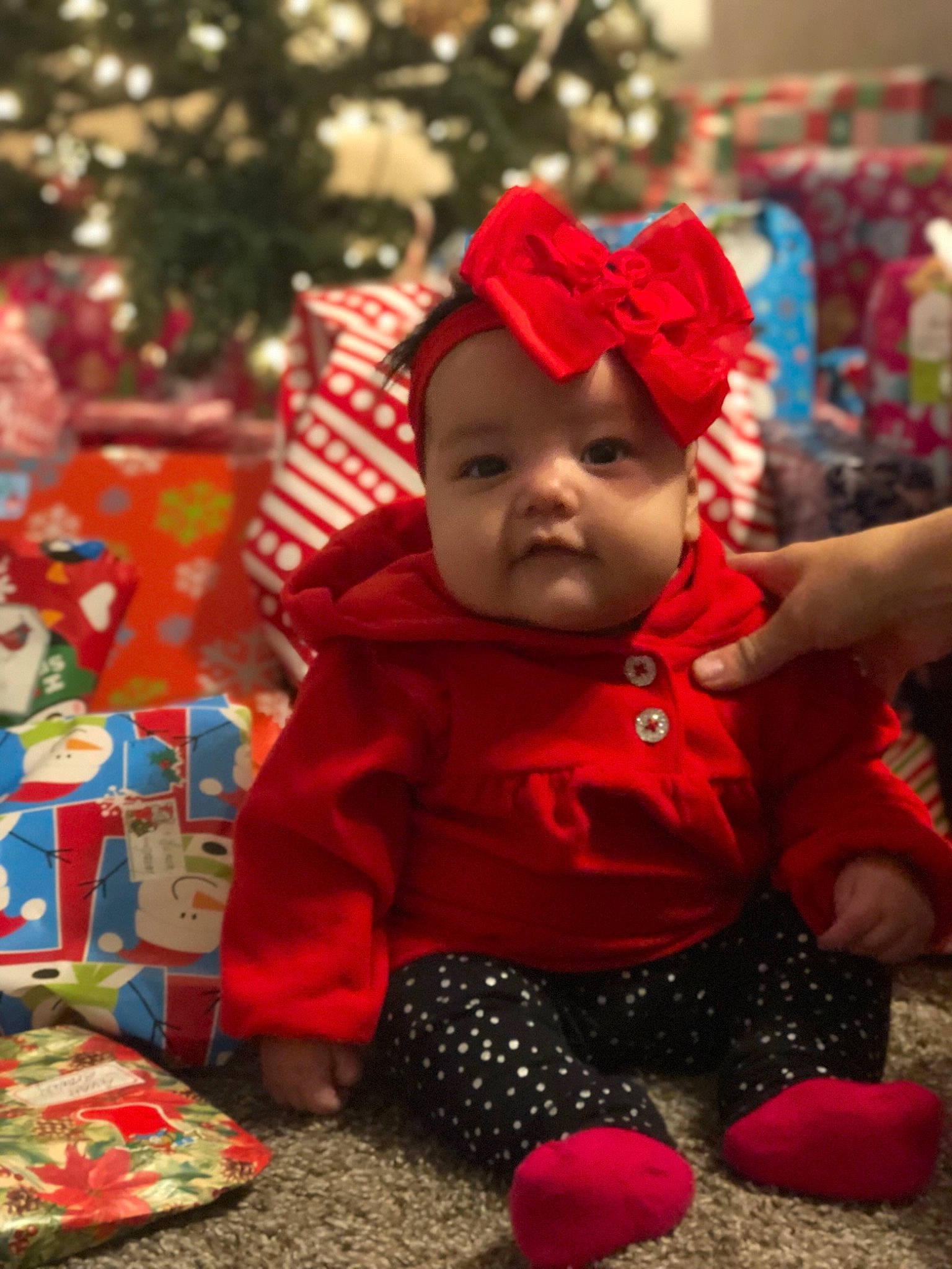 Lailani is registered to the contest to win money with this photo: child, christmas, event, fun, headgear, holiday, infant, person, product, red, toddler