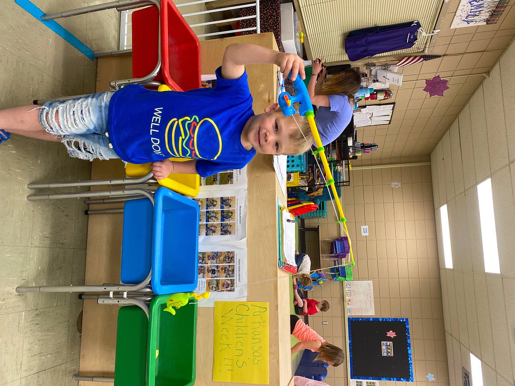 Paxton joined the competition — help win amazing prizes! basketball, basketball_hoop, door, electric_blue, engineering, fun, joy, leisure, machine, person, recreation, red, room, shorts, sports_uniform, sportswear, t_shirt, window, yellow