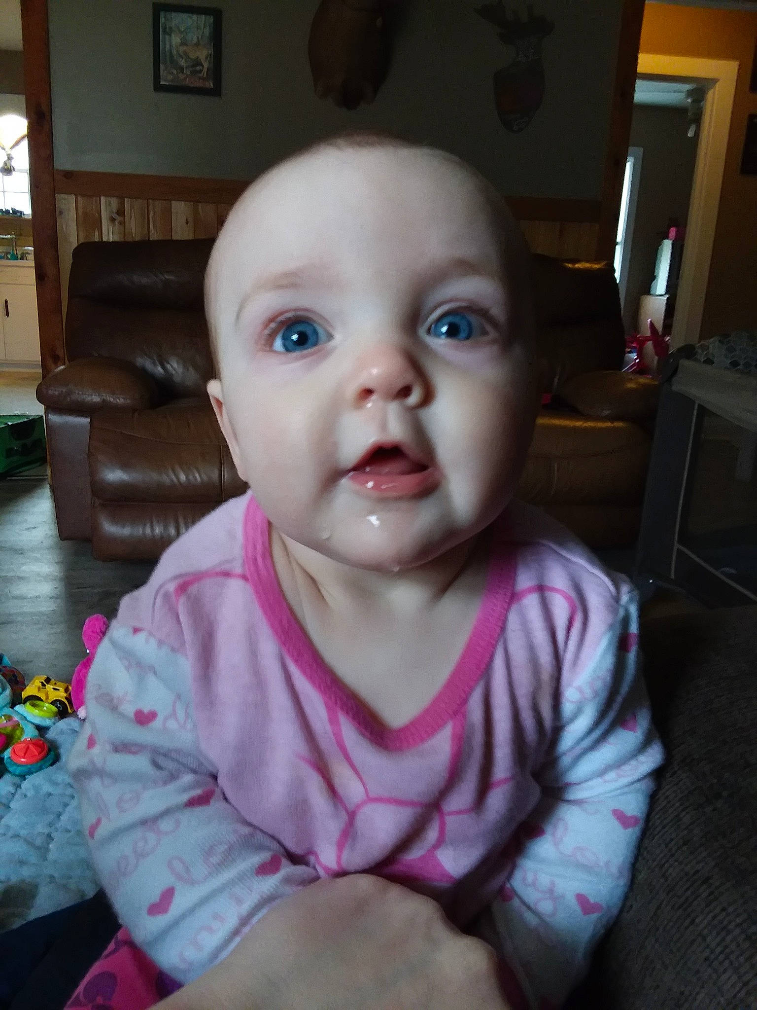 Heartlee is registered to the contest to win money with this photo: baby, cheek, child, eye, face, head, iris, lip, mouth, nose, person, sitting, skin, smile, toddler