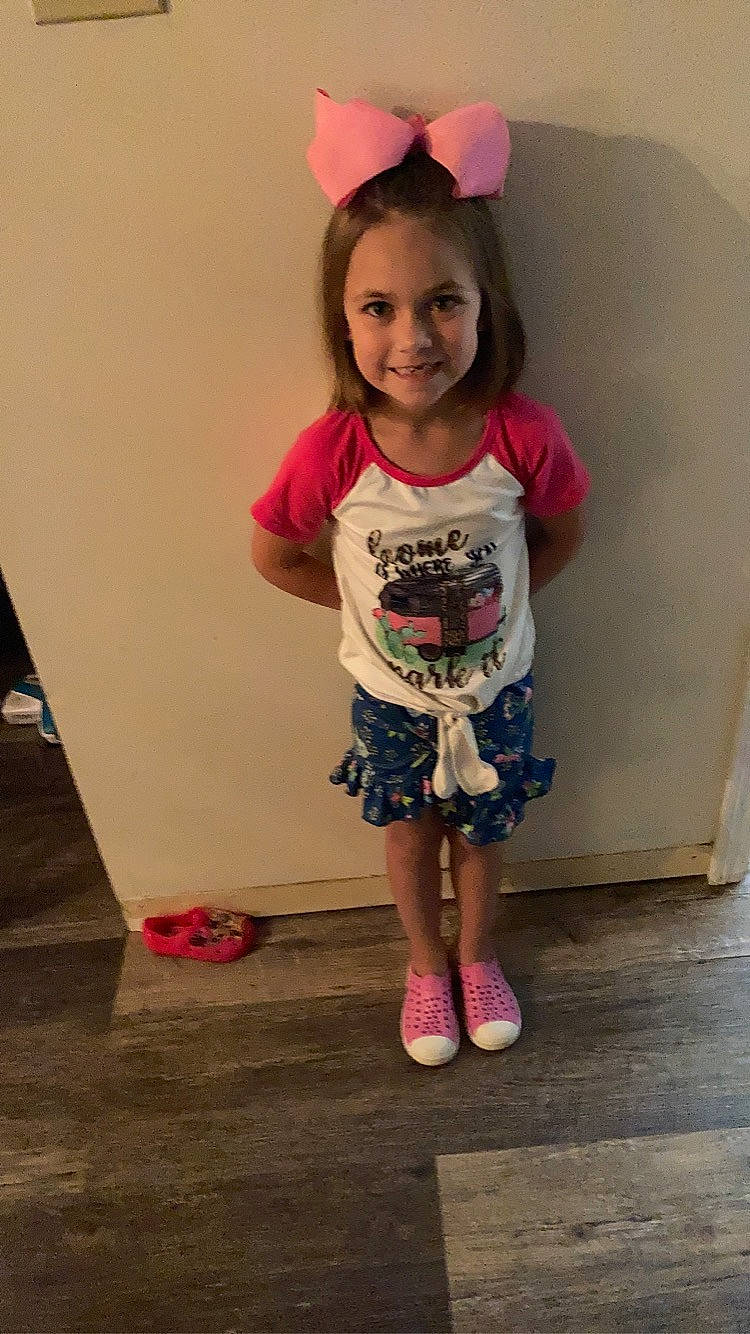 Lizzy joined the competition — help win amazing prizes! baby_toddler_clothing, child, clothing, eye, face, floor, flooring, fun, happy, head, joy, knee, leg, magenta, person, pink, skin, sleeve, smile, sock