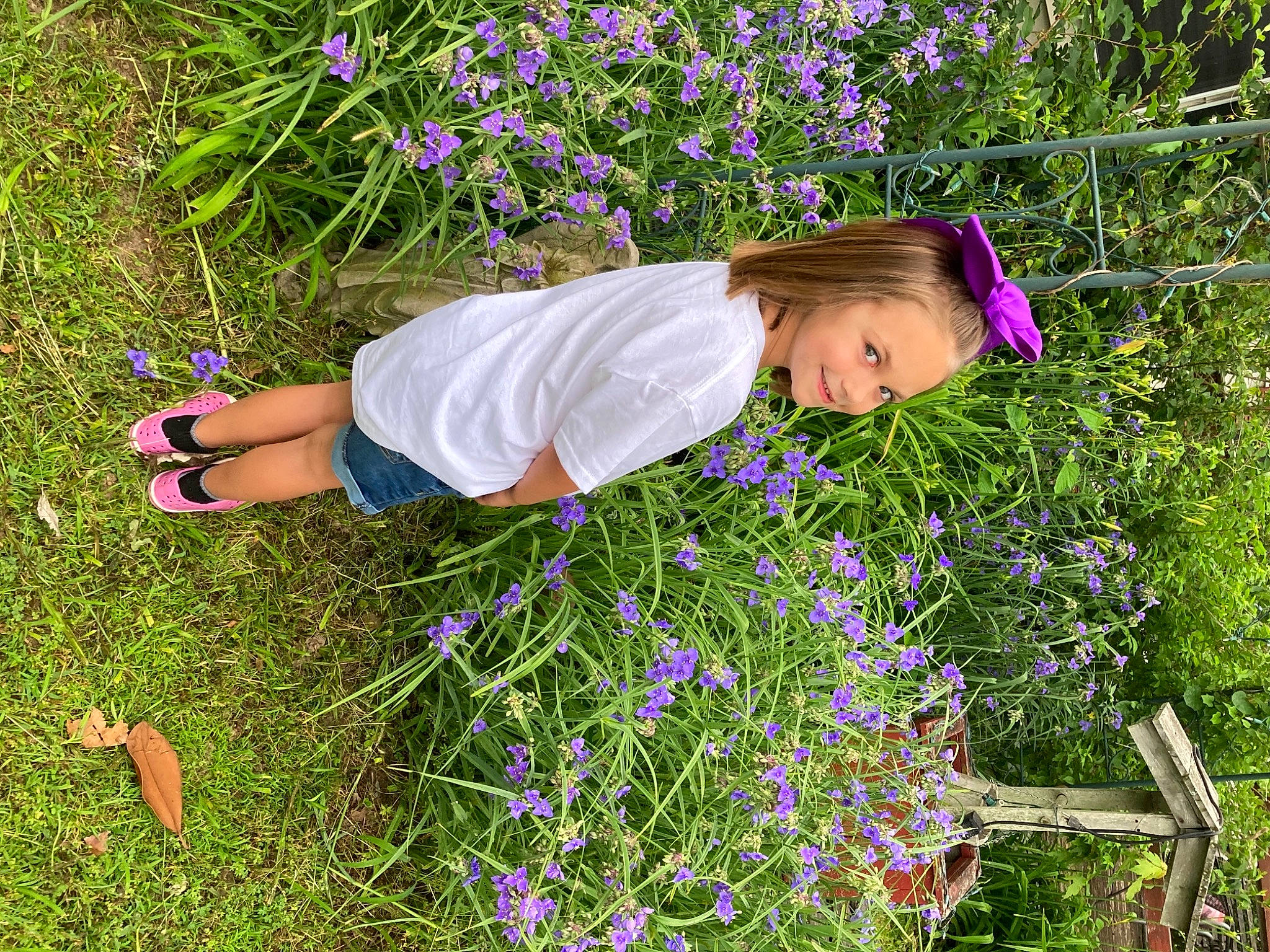 Lizzy joined the competition — help win amazing prizes! annual_plant, blue, electric_blue, flower, flowering_plant, grass, grass_family, grassland, groundcover, happy, herbaceous_plant, joy, meadow, people_in_nature, person, petal, plant, prairie, purple, shrub