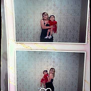 Valentina joined the competition — help win amazing prizes! black_dress, child, family, footwear, glasses, happy, heart_doodle, holding, indoor, patterned_wall, people, photo_album, portrait, posing, red_dress, sandals, smile, toddler, two_photos, woman