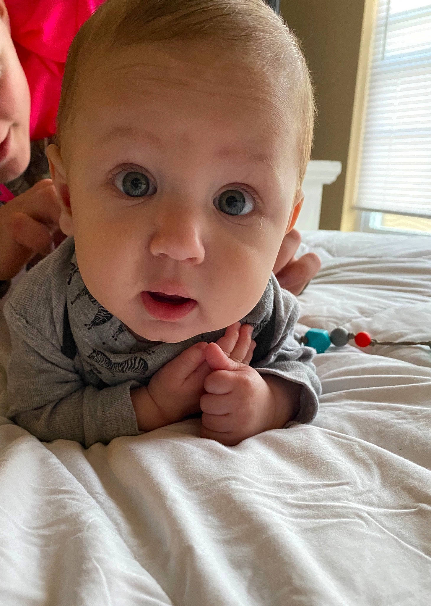 Kaysen is registered to the contest to win money with this photo: baby, beauty, cheek, child, chin, close_up, ear, eye, face, finger, forehead, hand, head, lip, mouth, nose, organ, person, skin, surprise