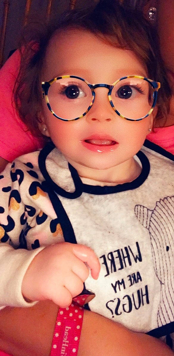 Brynley is registered to the contest to win money with this photo: black_hair, brown_hair, cheek, child, cool, eyebrow, eyewear, face, forehead, glasses, lip, nose, person, photography, selfie, smile, sunglasses, toddler, vision_care