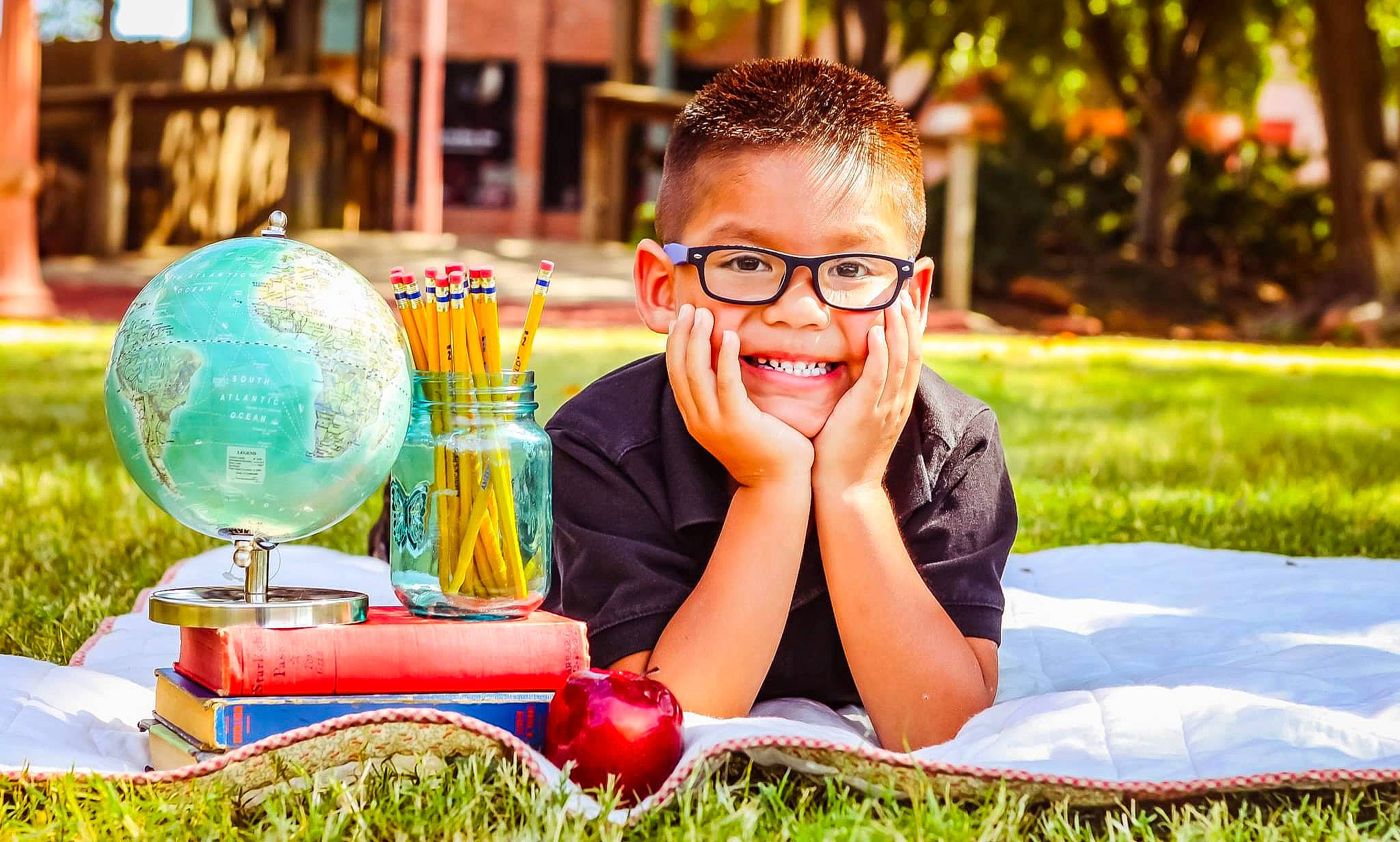 Corey James is registered to the contest to win money with this photo: drink, eyewear, glasses, grass, happy, joy, leisure, person, picnic, recreation, sitting, summer, vacation