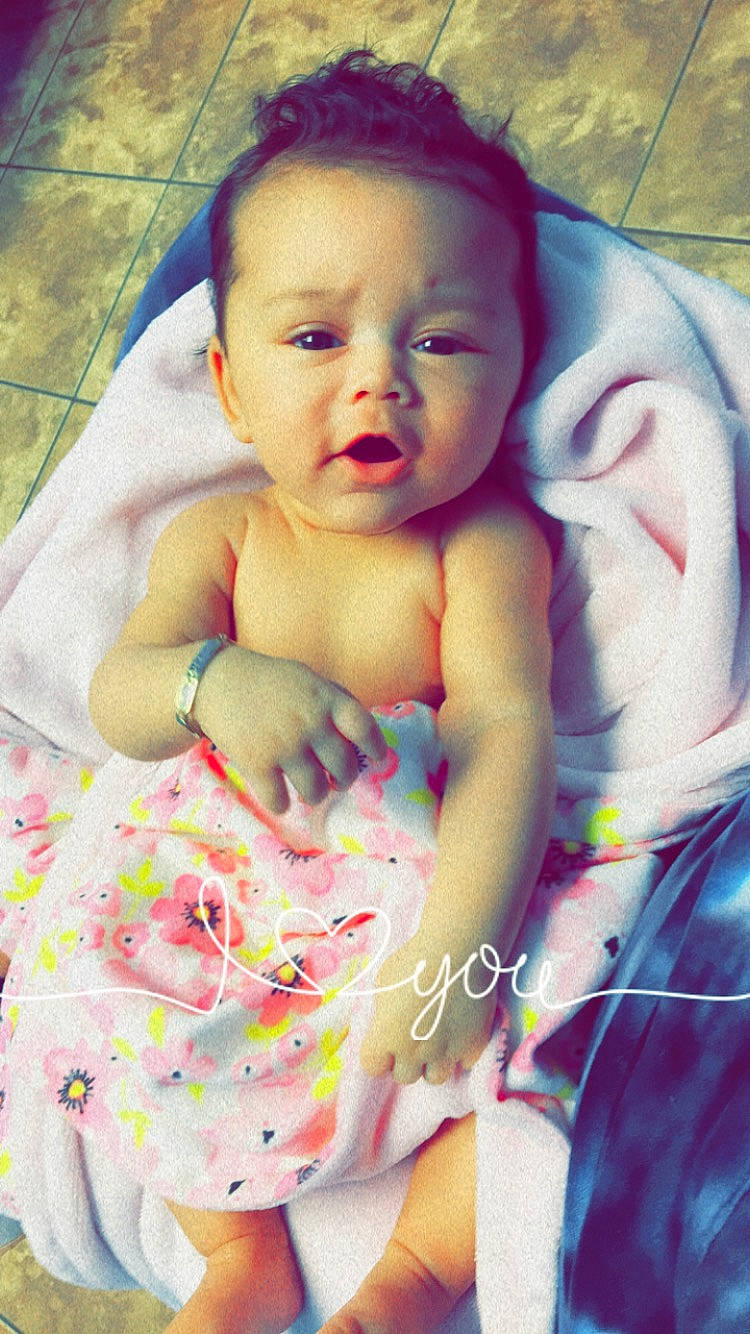 Shanelle joined the competition — help win amazing prizes! arm, baby, baby_toddler_clothing, comfort, eye, face, facial_expression, finger, hairstyle, hand, happy, head, iris, lip, mouth, person, pink, product, skin, textile