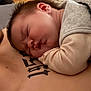 baby, sleeping, tattoo, skin, indoor, person, closeup, peaceful, child, resting, infant, head, face, arm, soft, human, portrait, cozy, warm, quiet