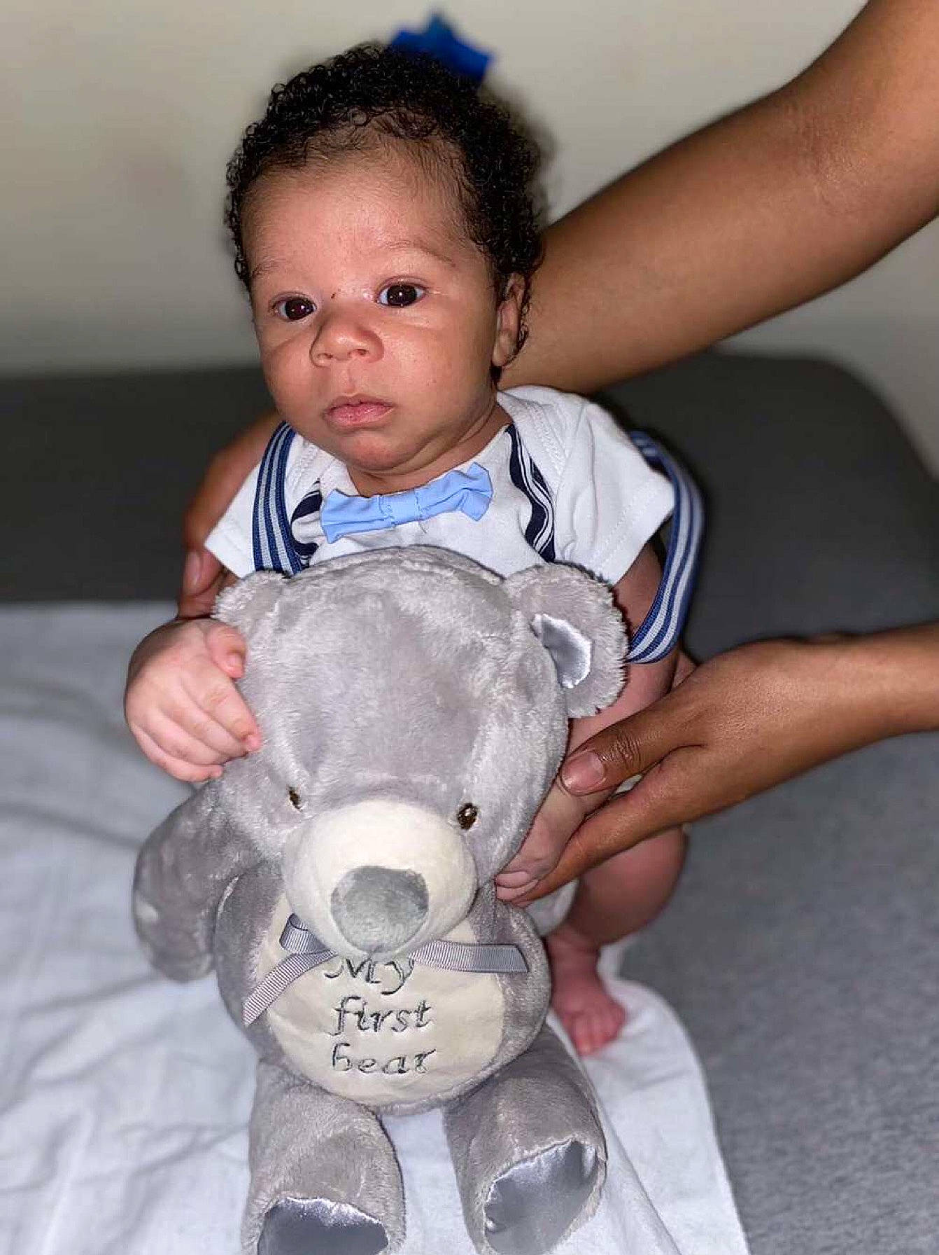 Zidane joined the competition — help win amazing prizes! baby, baby_products, baby_toddler_clothing, cheek, child, face, finger, flash_photography, fur, gesture, hand, happy, joint, nose, person, sitting, skin, stuffed_toy, teddy_bear, toddler