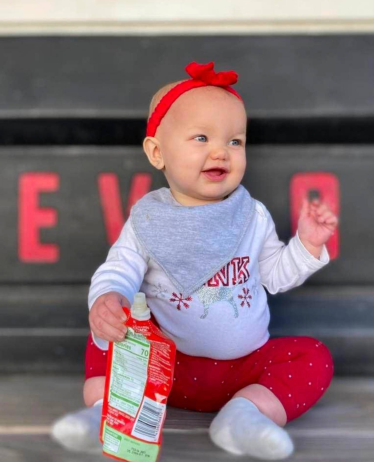 Huntleigh joined the competition — help win amazing prizes! baby, baby_toddler_clothing, cap, carmine, cheek, child, fun, happy, headwear, human_leg, knee, leg, person, product, red, sitting, skin, sleeve, smile, sock