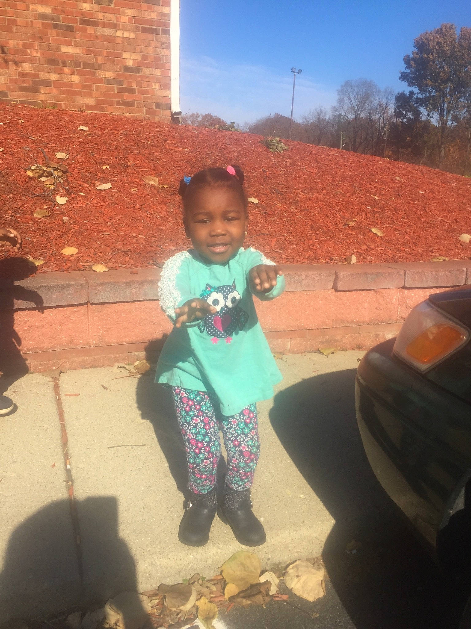 Chizaram is registered to the contest to win money with this photo: child, day, fun, girl, joy, person, pink, play, recreation, temple, toddler, tree, vacation