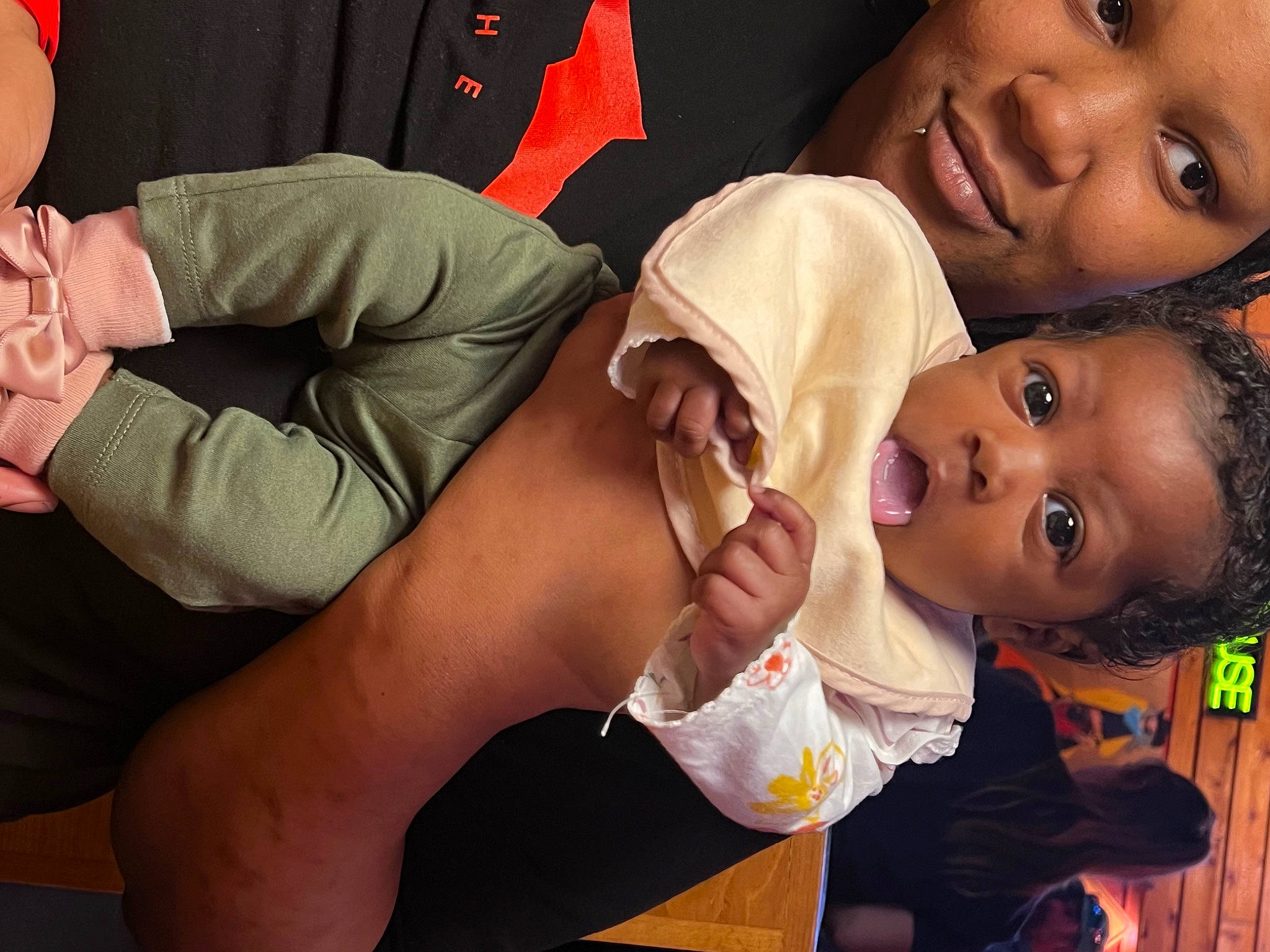 Logan is registered to the contest to win money with this photo: baby, cheek, child, comfort, elbow, event, eyelash, finger, flash_photography, fun, gesture, happy, human_body, joy, mouth, muscle, nose, person, skin, smile