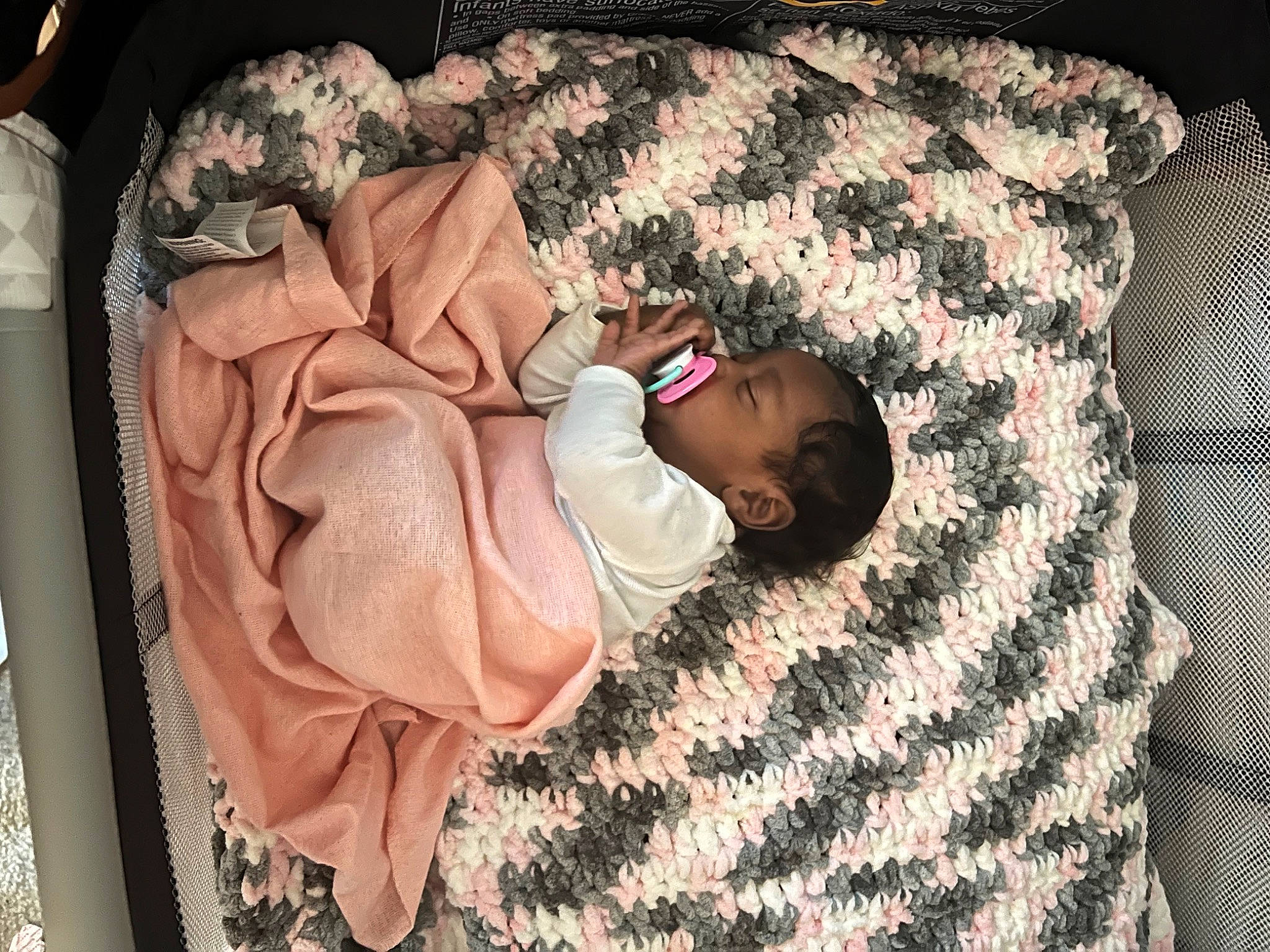 Logan is registered to the contest to win money with this photo: baby, baby_products, baby_sleeping, baby_toddler_clothing, bed, bed_sheet, bedding, bedroom, bedtime, blanket, child, comfort, flooring, linens, nap, pattern, person, room, sleep, toddler