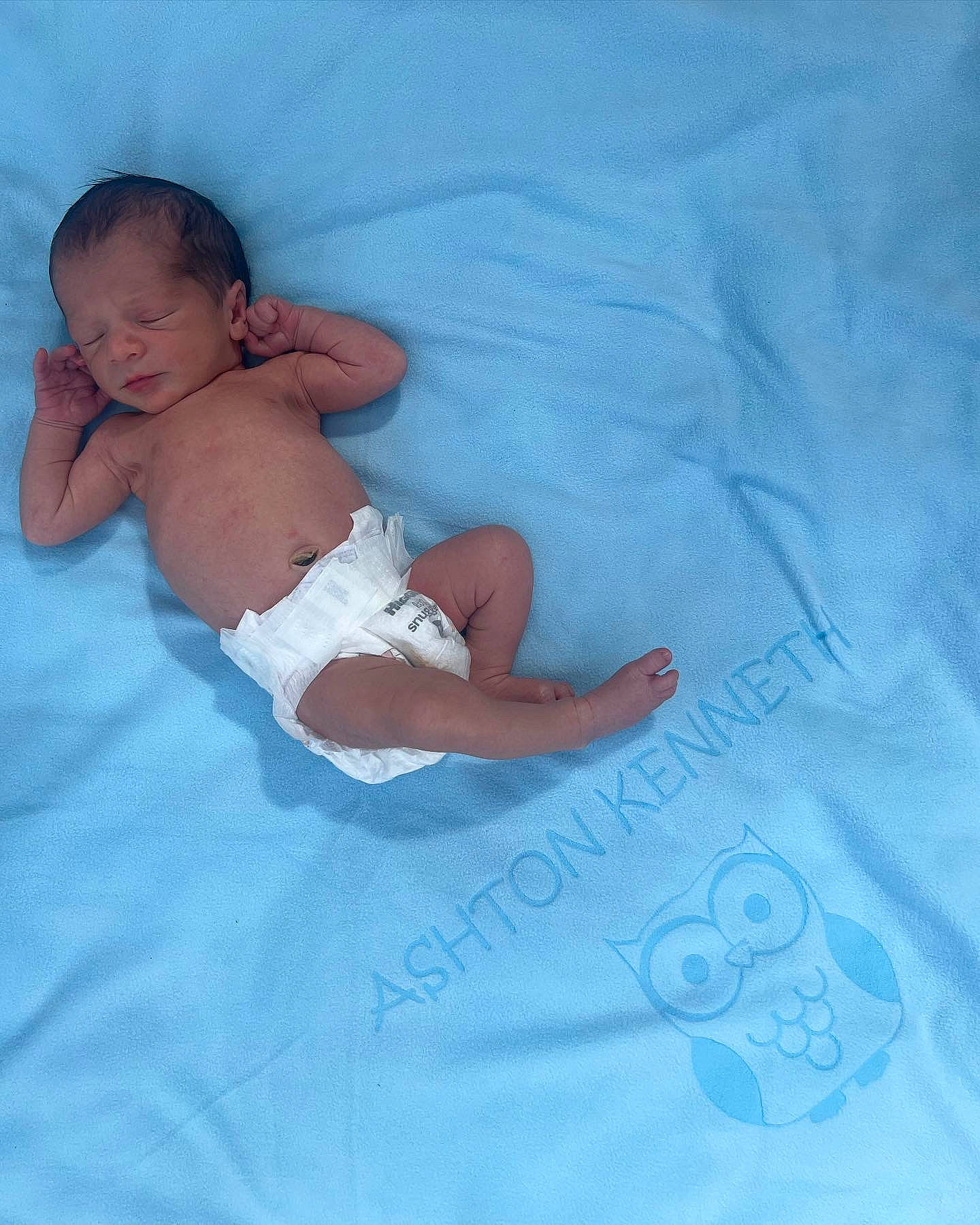 Ashton is registered to the contest to win money with this photo: abdomen, baby, baby_products, baby_toddler_clothing, barefoot, chest, child, comfort, elbow, foot, fun, happy, human_body, human_leg, leisure, linens, pattern, person, stomach, textile