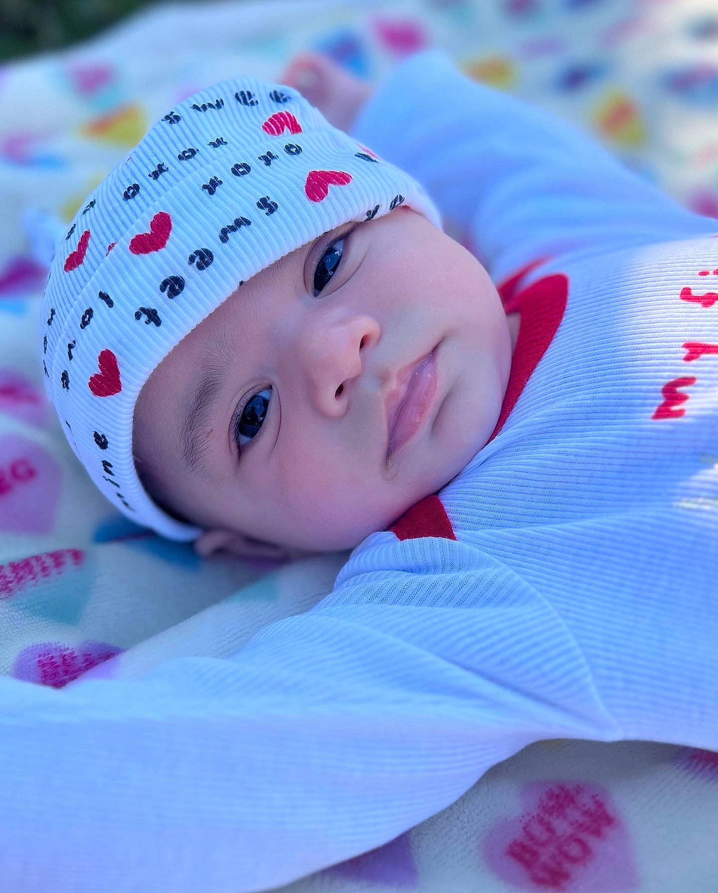 Ashton joined the competition — help win amazing prizes! baby, baby_toddler_clothing, cap, carmine, child, comfort, electric_blue, fashion_accessory, fun, hair_accessory, happy, hat, headwear, lip, magenta, pattern, person, pink, portrait_photography, smile