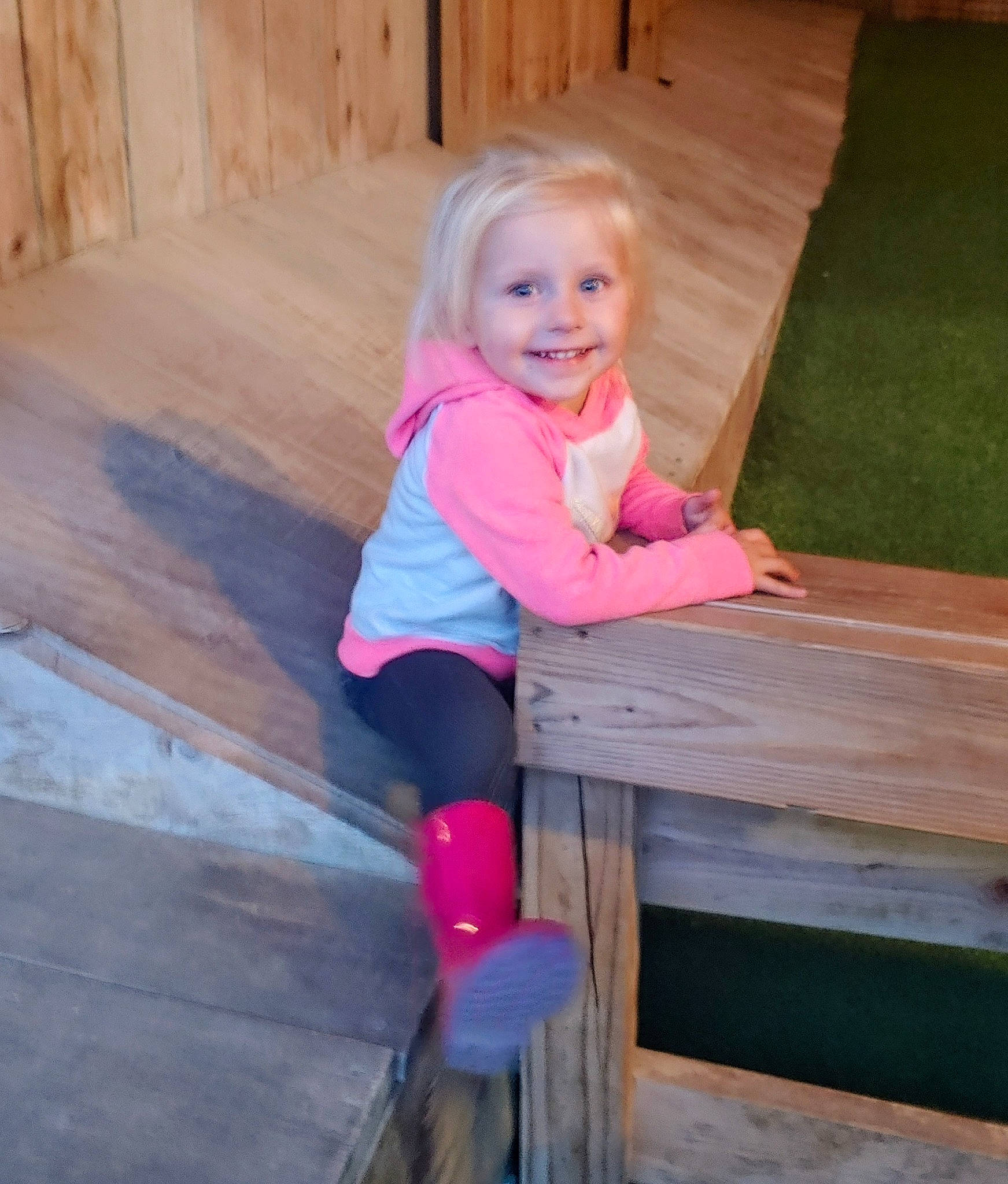 Zeppelin joined the competition — help win amazing prizes! baby_toddler_clothing, door, face, fun, hair, happy, hardwood, joy, leg, leisure, magenta, outdoor_furniture, outerwear, person, pink, plank, skin, sleeve, smile, toddler