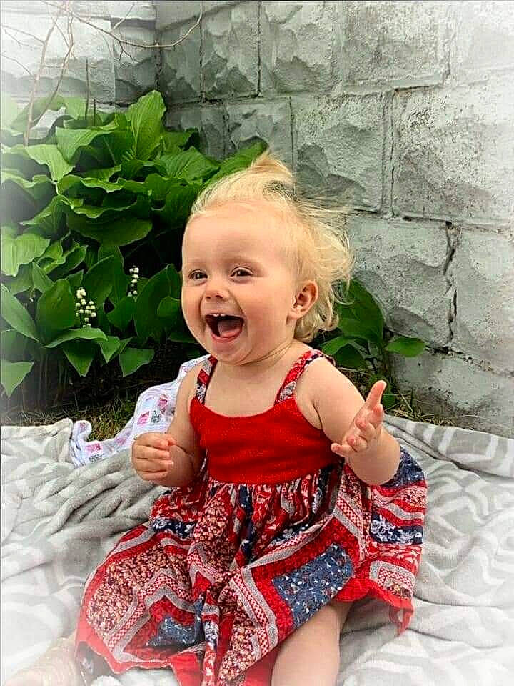 Zeppelin joined the competition — help win amazing prizes! baby_toddler_clothing, beauty, dress, eye, face, facial_expression, grass, hairstyle, happy, head, leaf, person, photograph, pink, plant, skin, sleeve, smile, snapshot, summer