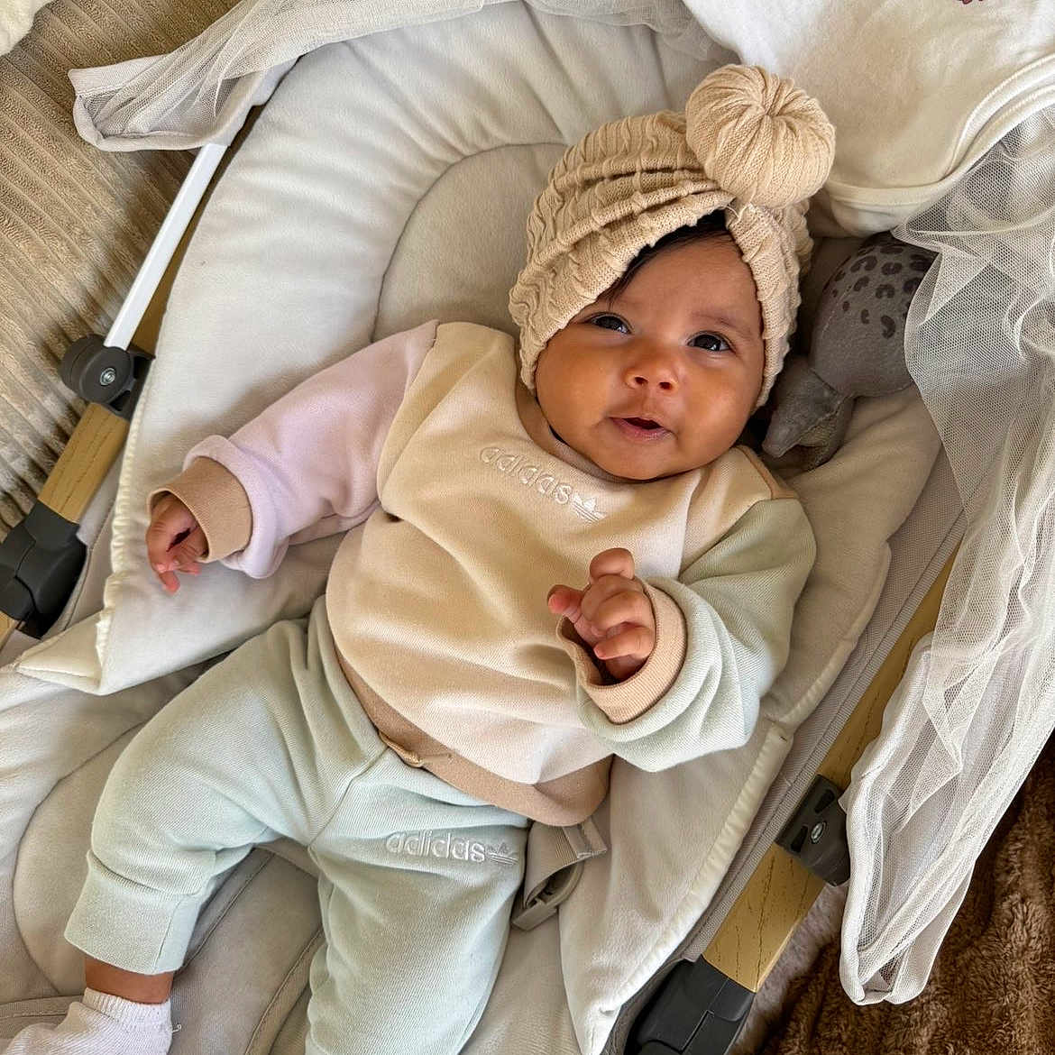 şilan participe au concours pour gagner de l'argent avec cette photo : adidas, baby, bassinet, beanie, blanket, bouncer, cushion, cute, face, hands, hat, home_interior, infant, newborn, onesie, portrait, smile, socks, soft_fabric, toy