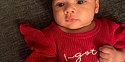 Alyza is registered to the contest to win money with this photo: baby, bodypart, clothing, couch, cushion, face, finger, flower, furniture, hand, head, homedecor, pants, person, photography, plant, portrait, rose, sitting, t_shirt