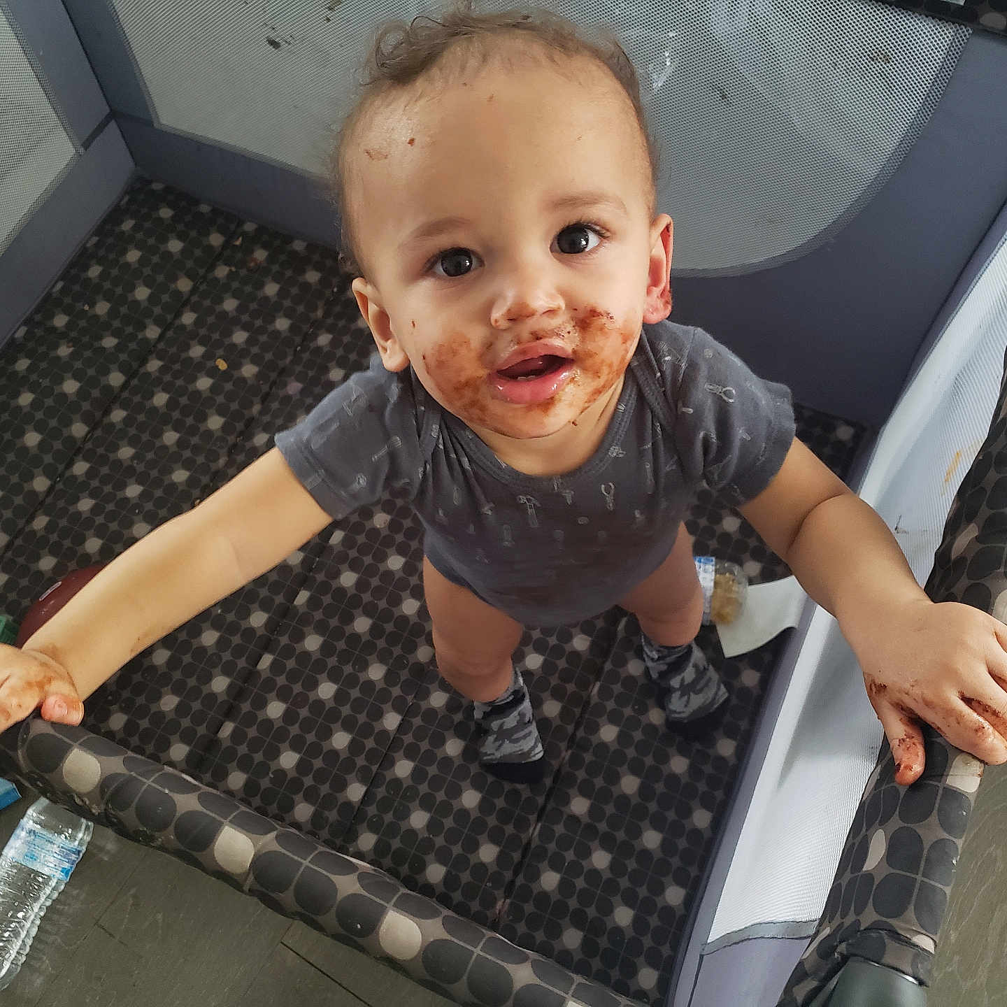 Jeriyah is registered to the contest to win money with this photo: animal, baby, babylaughing, bodypart, clothing, crawling, crib, face, finger, footwear, furniture, hand, happy, head, infantbed, person, photography, playarea, portrait, shoe