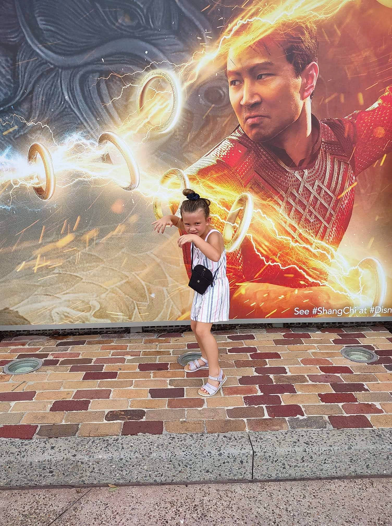 Sadie Grace is registered to the contest to win money with this photo: art, child, entertainment, event, flash_photography, flooring, fun, happy, heat, leisure, line, painting, pattern, people_in_nature, person, recreation, sky, standing, toddler, tree