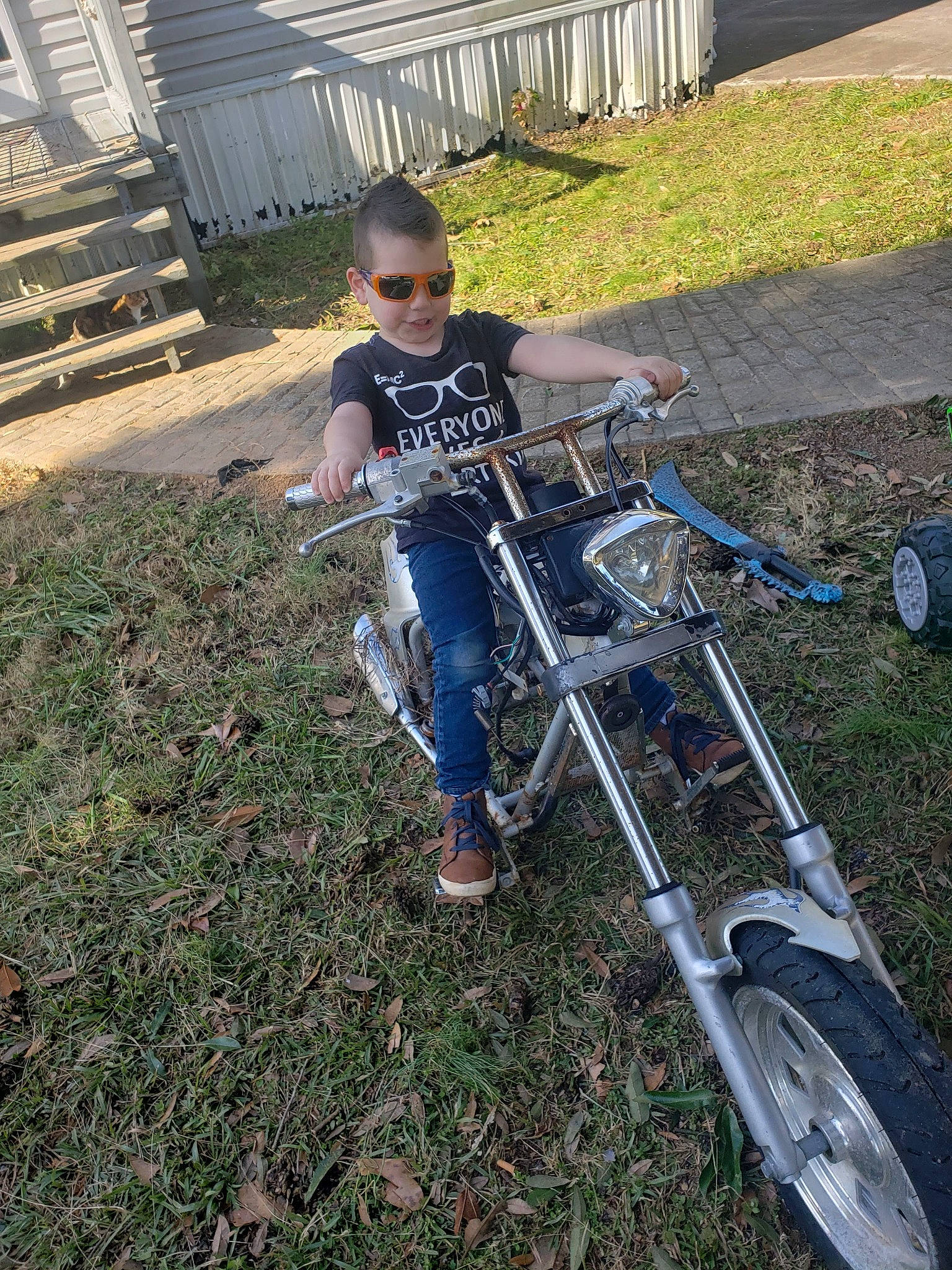 Campbell is registered to the contest to win money with this photo: automotive_tire, bicycle, bicycle_accessory, bicycle_fork, bicycle_frame, bicycle_handlebar, bicycle_part, bicycle_saddle, bicycle_tire, bicycle_wheel, bicycles_equipment_and_supplies, grass, lawn, motor_vehicle, person, plant, recreation, tire, tread, vehicle