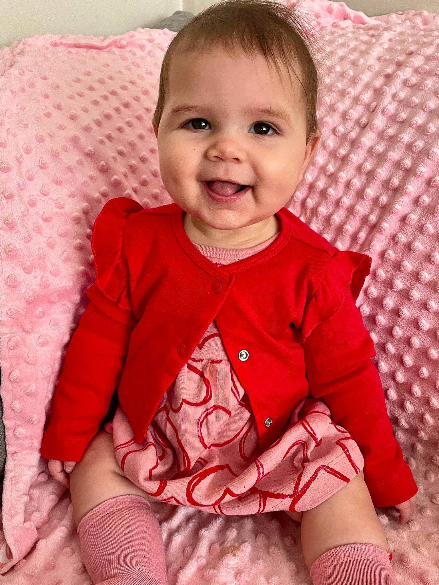 Everley is registered to the contest to win money with this photo: baby, baby_toddler_clothing, cheek, child, clothing, dress, eye, face, happy, head, iris, joy, magenta, outerwear, pattern, person, pink, skin, sleeve, smile