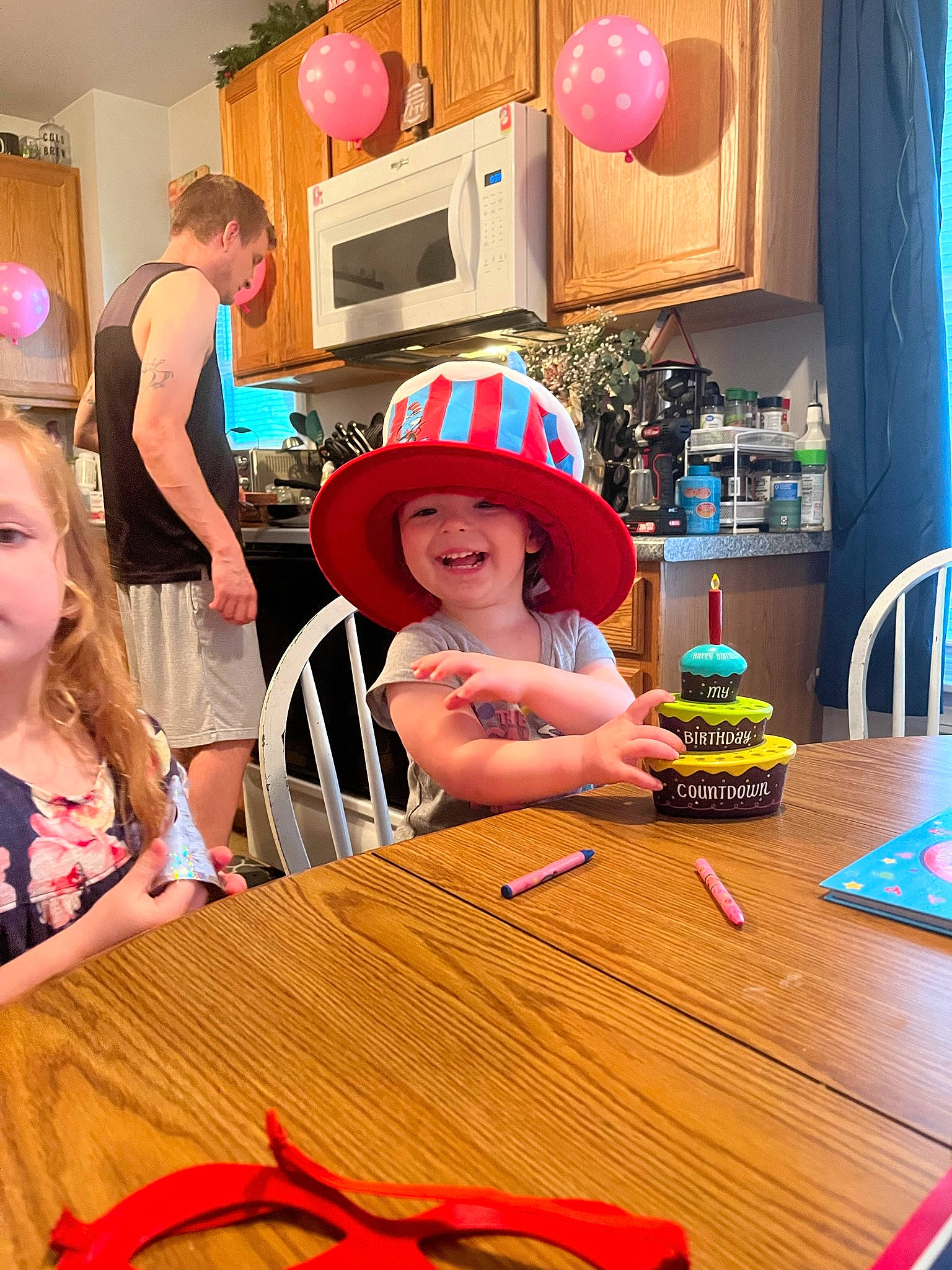 Isla joined the competition — help win amazing prizes! chair, child, curtain, desk, event, fedora, flooring, fun, happy, hat, headgear, headwear, home_appliance, joy, party_supply, person, pink, room, smile, snapshot