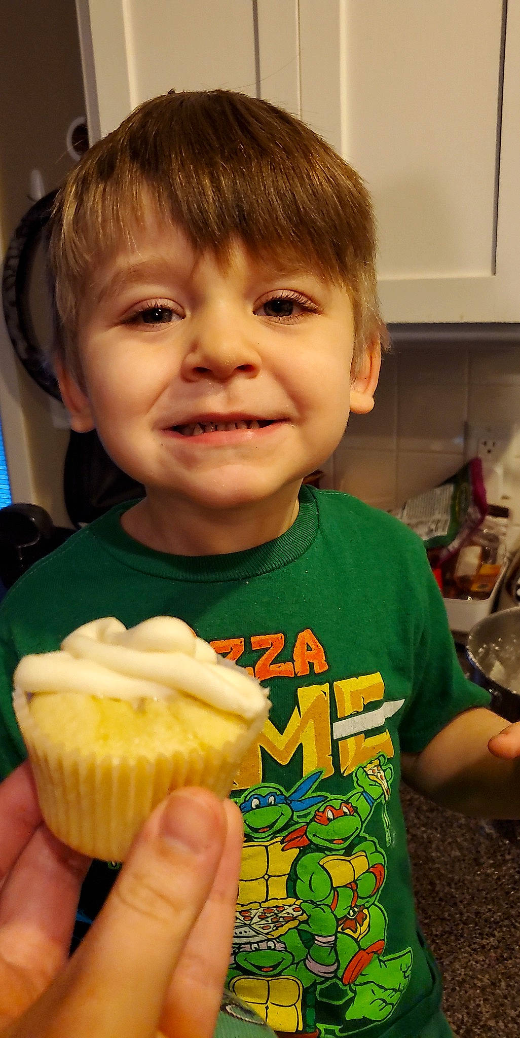 Konner is registered to the contest to win money with this photo: baked_goods, baking, baking_cup, clotted_cream, cream, cuisine, cupcake, dessert, dish, food, frozen_dessert, home_appliance, ingredient, joy, junk_food, kitchen_appliance, person, recipe, smile, sweetness