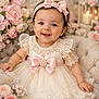 Jasmin participe au concours pour gagner de l'argent avec cette photo : baby, infant, child, smile, dress, lace, bow, headband, flowers, roses, pink, portrait, bokeh, soft_lighting, candle, birdcage, plush_chair, tulle, hands, eyes