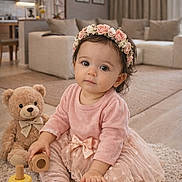 Jasmin participe au concours pour gagner de l'argent avec cette photo : baby, toddler, child, floral_headband, pink_dress, tutu, bow, socks, teddy_bear, stuffed_toy, wooden_blocks, ring_stack, carpet, rug, living_room, sofa, cushions, interior, portrait, playtime