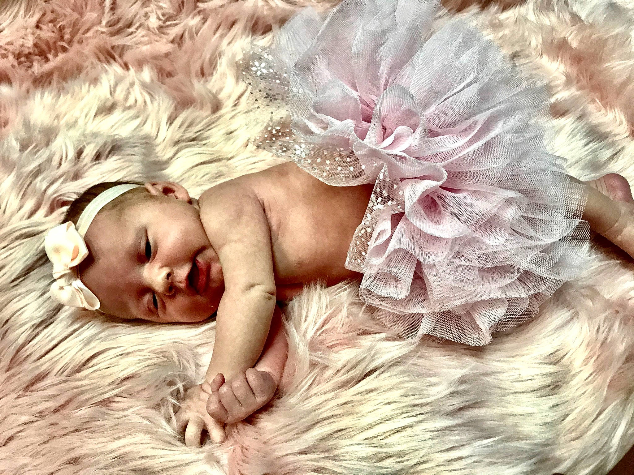 Tymber is registered to the contest to win money with this photo: baby, beauty, child, ear, fashion_accessory, fictional_character, fur, hair, hair_accessory, hand, happy, headgear, long_hair, love, person, photo_shoot, photography, pink, sleep, smile
