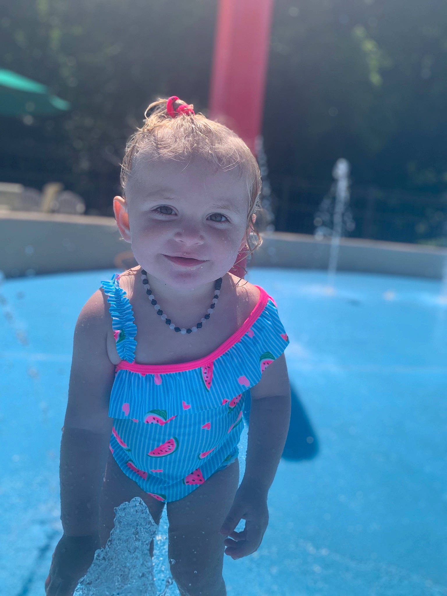 Emma joined the competition — help win amazing prizes! aqua, azure, baby_toddler_clothing, bathing, blue, child, electric_blue, face, fun, happy, headgear, leisure, one_piece_swimsuit, person, recreation, smile, summer, swimming_pool, swimwear, toddler