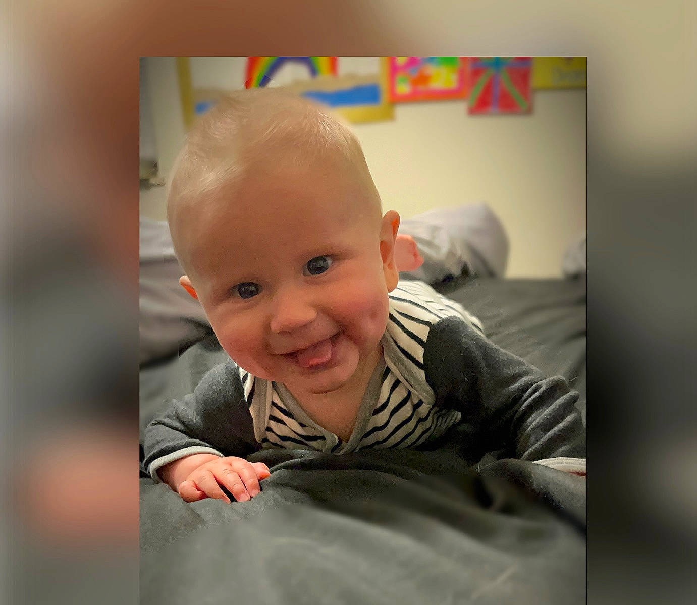 Tyler is registered to the contest to win money with this photo: art, baby, baby_toddler_clothing, cheek, child, comfort, crawling, flash_photography, flooring, fun, happy, joy, laugh, nose, person, room, sitting, sleeve, smile, t_shirt