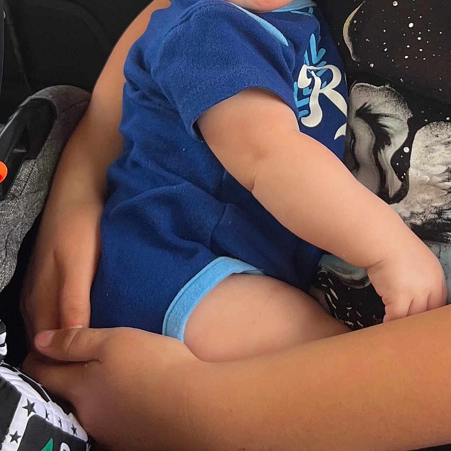 Casen is registered to the contest to win money with this photo: arms, baby, baby_clothes, blue_clothing, car_seat, child, cute, face, hand, happy, holding, indoor, infant, legs, person, portrait, sitting, skin, smiling, young