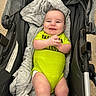 Casen is registered to the contest to win money with this photo: baby, babywear, blanket, child, clothing, cute, fabric, face, hands, happy, head, indoor, infant, onesie, person, portrait, seat, skin, smiling, stroller