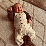 Lowen a rejoint le concours — aidez-le/la à gagner de superbes lots ! baby, smiling, infant, overalls, slippers, rug, textured, cozy, cute, happy, lying_down, indoor, child, person, small_clothing, furniture, warm, casual, home, comfort