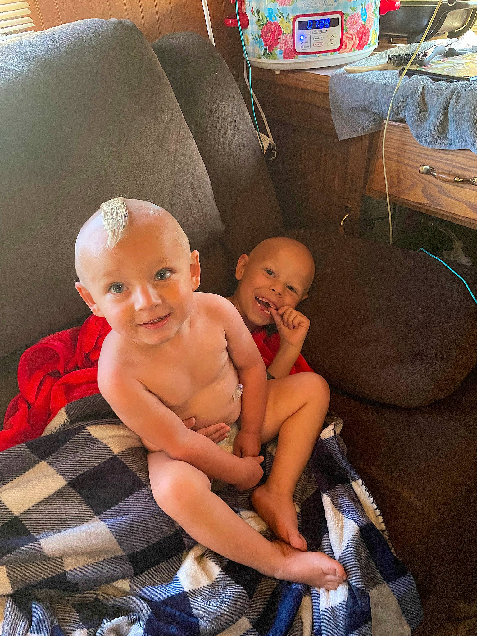 Chase joined the competition — help win amazing prizes! abdomen, baby, barechested, chest, child, comfort, couch, event, fun, happy, human_leg, joy, lap, person, plaid, shorts, sitting, smile, tartan, thigh