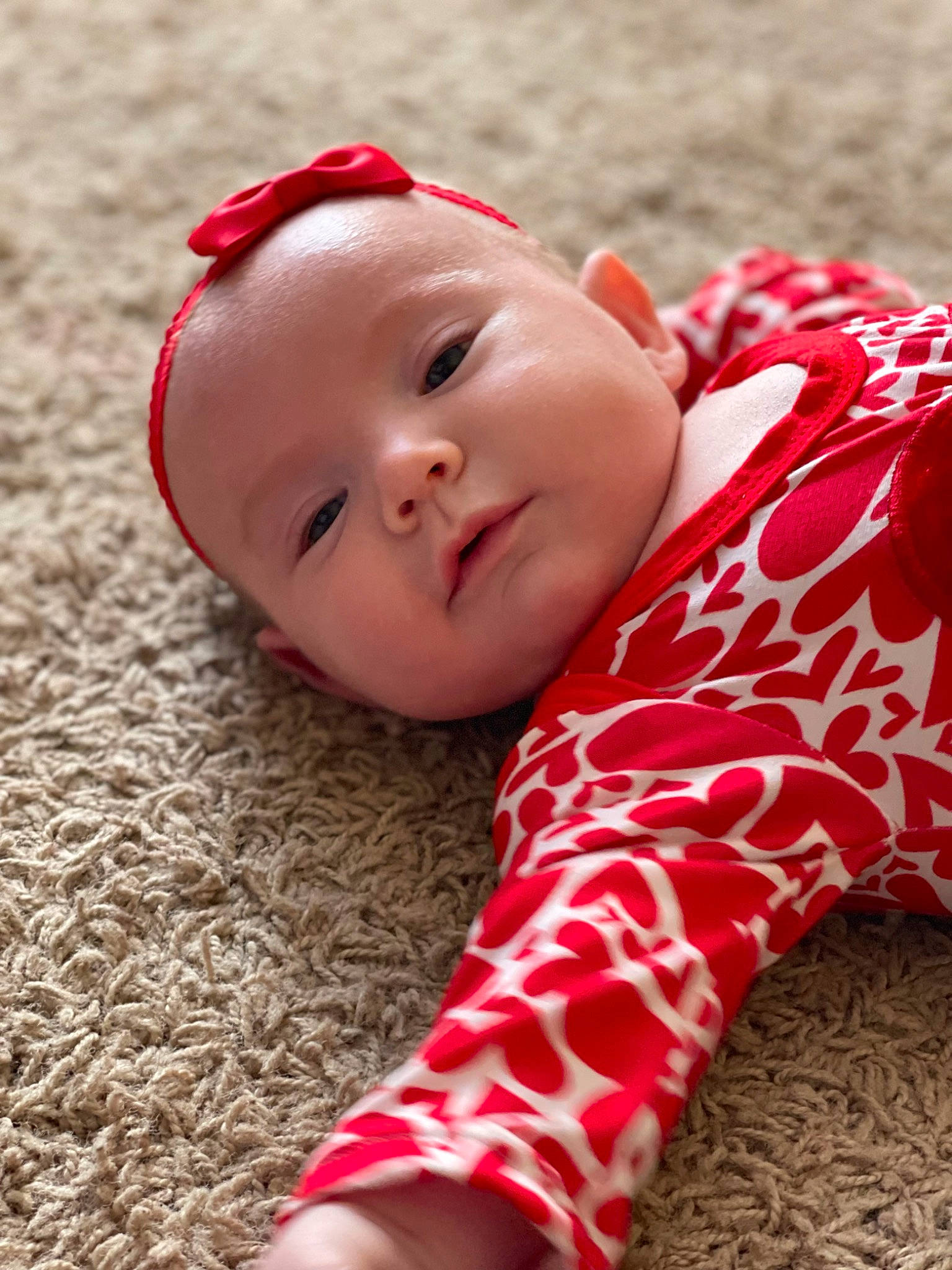 Saylor is registered to the contest to win money with this photo: baby, baby_laughing, baby_toddler_clothing, cap, child, close_up, eye, grass, happy, hat, headwear, leaf, lip, mammal, pattern, people_in_nature, person, skin, sleeve, smile