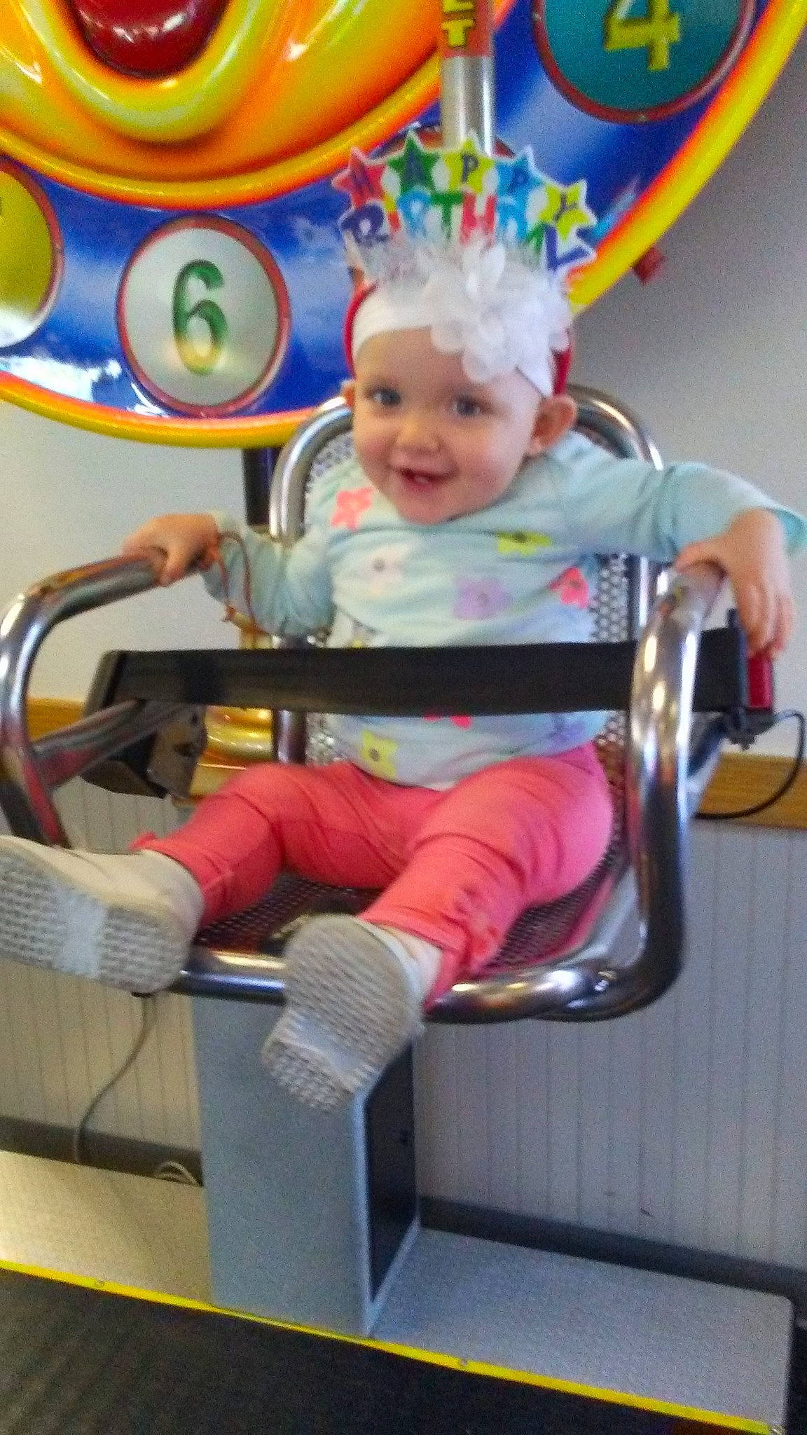 Swayze is registered to the contest to win money with this photo: chair, child, fun, furniture, infant, joy, person, play, product, room, sitting, toddler, toy