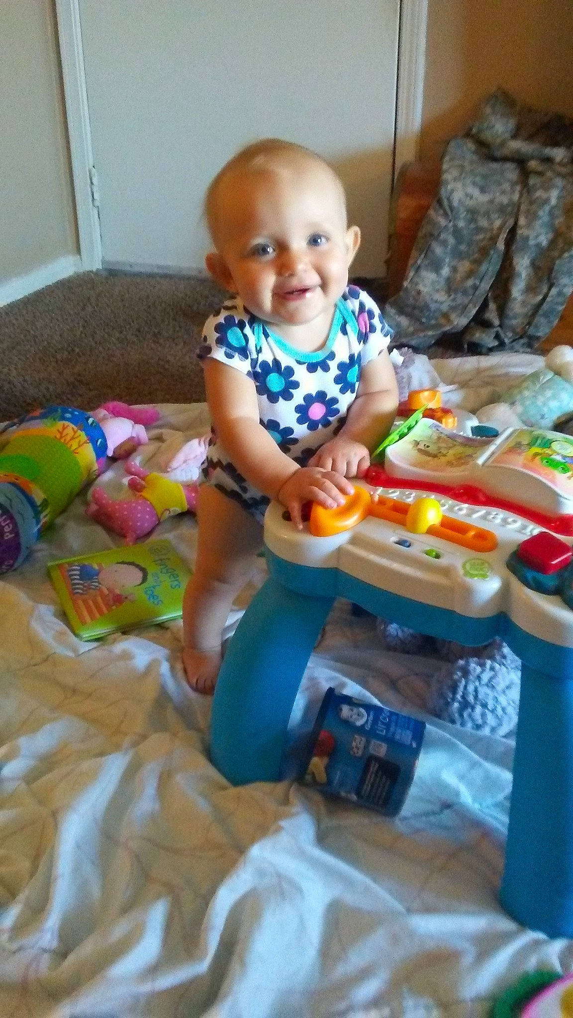 Swayze is registered to the contest to win money with this photo: baby_products, child, day, finger, fun, infant, person, play, product, sitting, toddler, toy