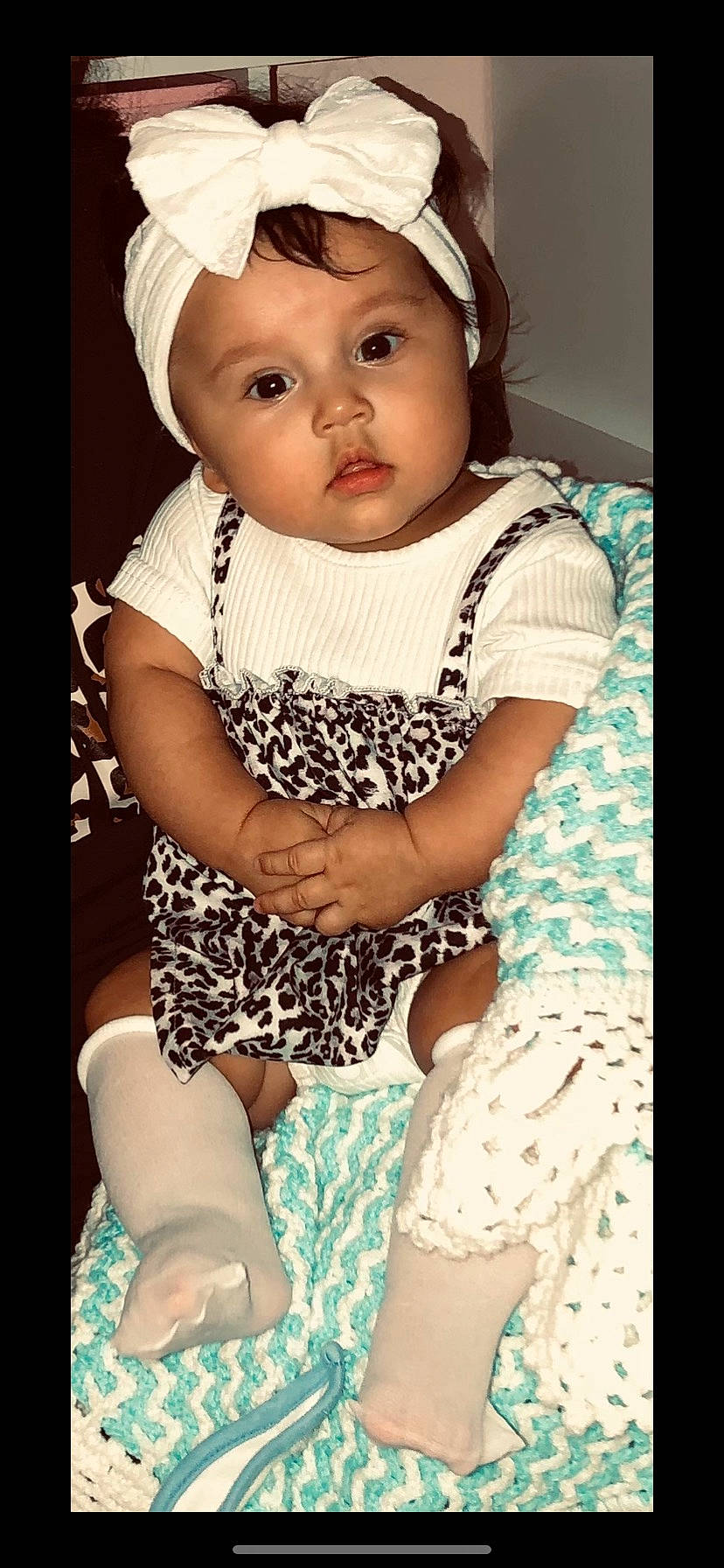 Luna joined the competition — help win amazing prizes! baby, baby_toddler_clothing, beauty, black, cap, child, eye, eyelash, fashion_accessory, flash_photography, happy, headwear, knee, neck, pattern, person, photograph, sleeve, t_shirt, thigh