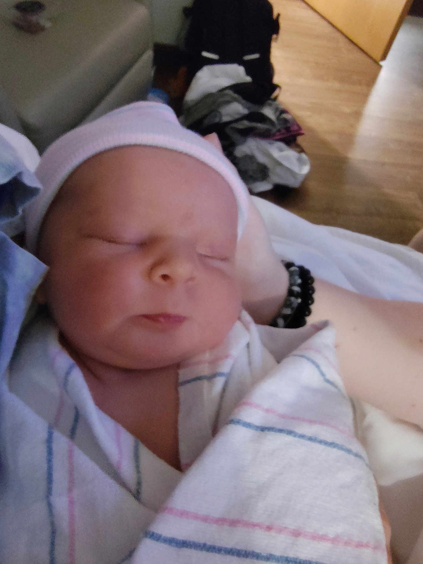 Weston joined the competition — help win amazing prizes! newborn, baby, infant, sleeping, blanket, cap, person, indoor, hospital, resting, closeup, soft, peaceful, wrapped, human, care, comfort, floor, arm, clothing