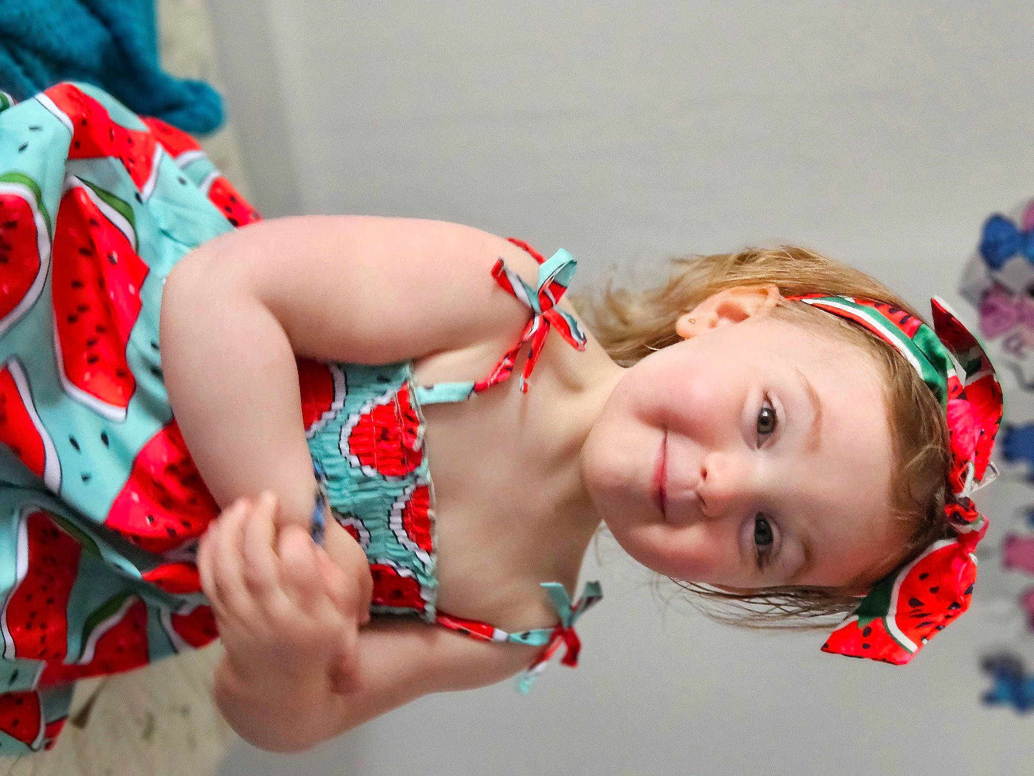 Lina participe au concours pour gagner de l'argent avec cette photo : chest, dress, eyelash, fun, happy, human_leg, jewellery, lip, mouth, nail, neck, pattern, person, red, skin, smile, thigh, toddler, toy, trunk