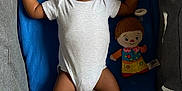 Zekani is registered to the contest to win money with this photo: baby, sleeping, blue_cushion, white_onesie, doll, playpen, infant, child, indoors, resting, cute, peaceful, toy, soft_light, skin, curly_hair, relaxing, toddler, nap, comfort