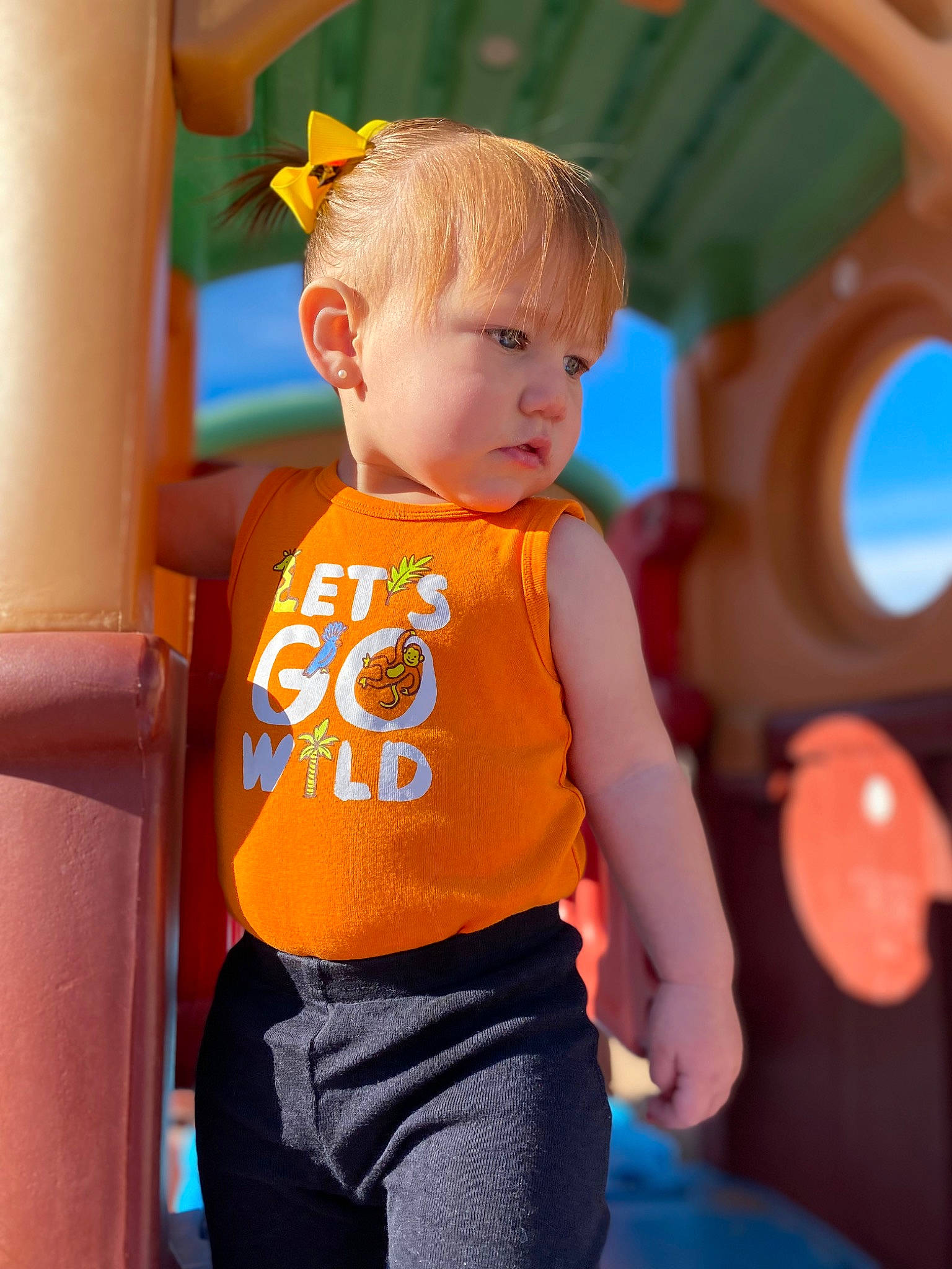 Karsyn is registered to the contest to win money with this photo: baby, baby_toddler_clothing, child, costume, electric_blue, fun, happy, leisure, orange, person, personal_protective_equipment, play, recreation, shorts, sitting, sleeve, t_shirt, toddler, vacation, waist