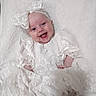 Rosalie joined the competition — help win amazing prizes! baby, infant, smile, happy, white, dress, lace, headband, fabric, soft, portrait, cute, child, newborn, lying_down, closeup, celebration, adorable, person, indoors