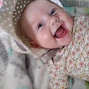 Rosalie joined the competition — help win amazing prizes! baby, child, smiling, hat, polka_dot, floral_clothing, face, happy, infant, portrait, cute, baby_clothes, indoors, closeup, headwear, person, skin, cheerful, young_child, expression