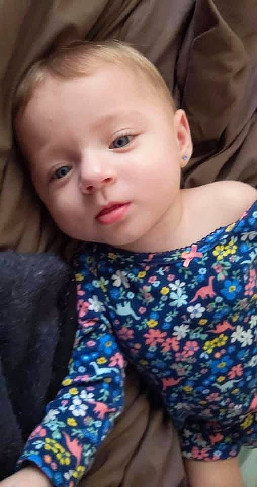 Elsa is registered to the contest to win money with this photo: baby, brown_hair, cheek, child, child_model, chin, eye, face, hair, head, iris, lip, nose, person, skin, smile, toddler